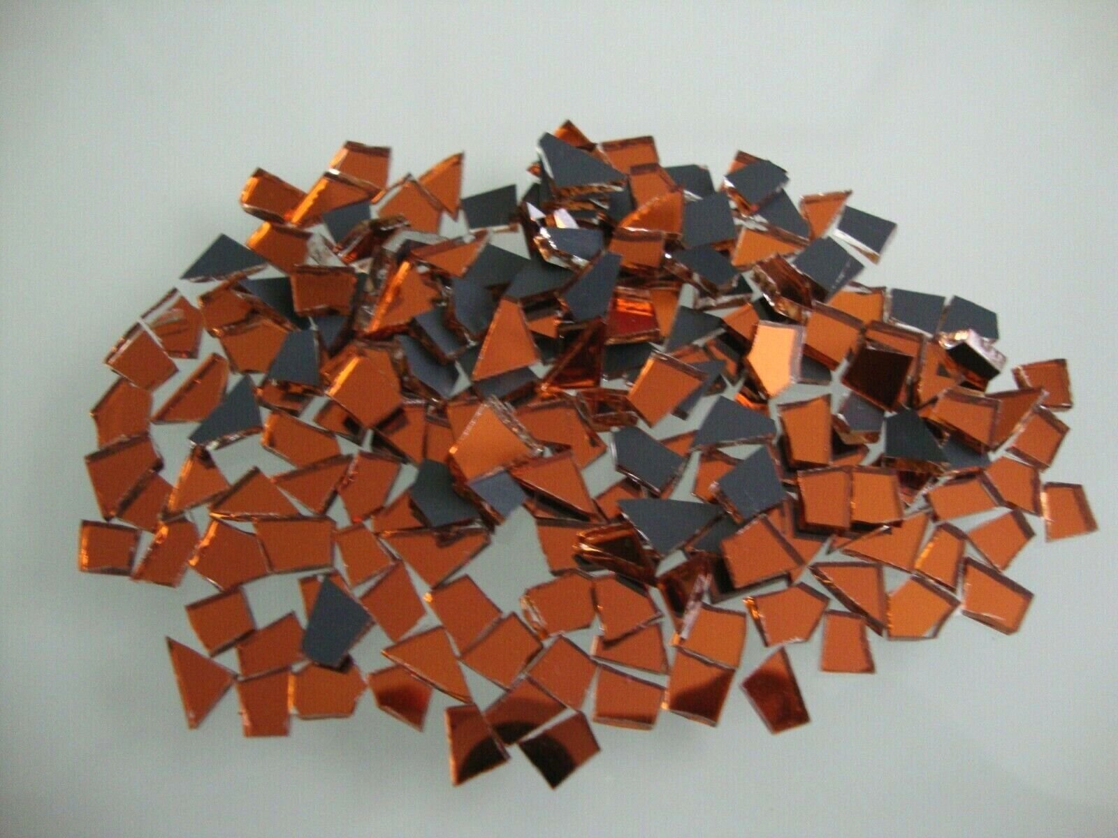 Mosaic Burnt Orange mirror glass tiny off cuts 1000 pieces 1.8 mm thick.