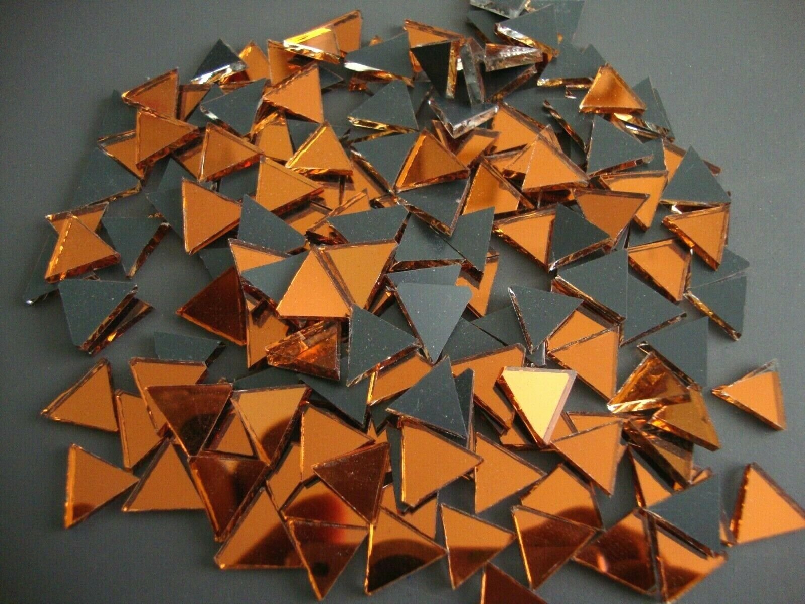 Mosaic 300 pieces triangular Burnt Orange mirror glass, 1x1x1 cm.